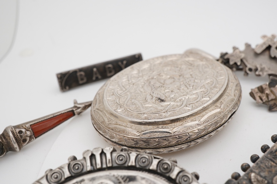 Ten assorted late 19th/early 20th century silver brooches, including three with names, Baby, Millicent and Ellen, together with five other white metal brooches including Scottish hardstones, a coin set stick pin, hardsto